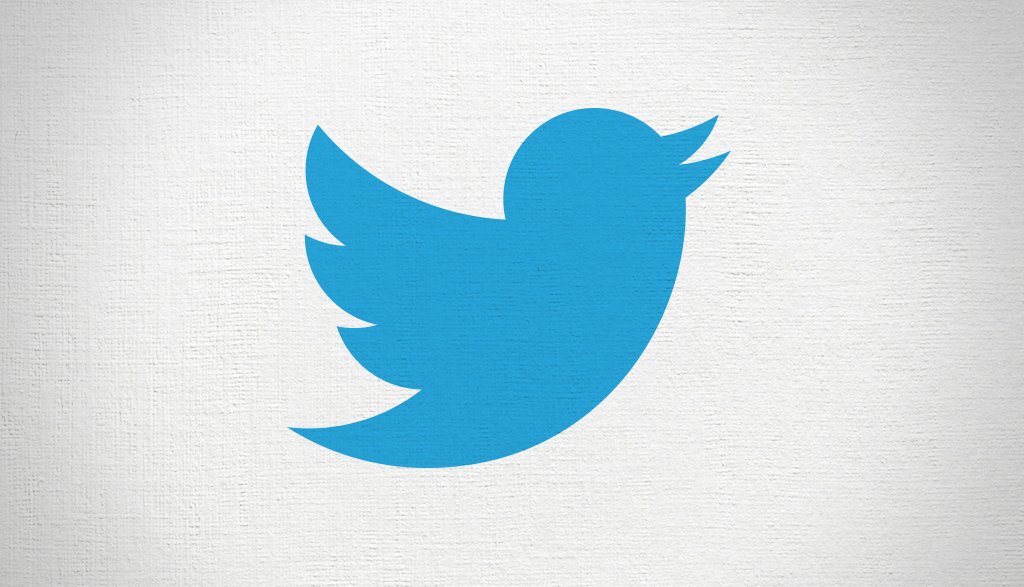 FILE -- The logo for the online social networking service Twitter on a texturized background.