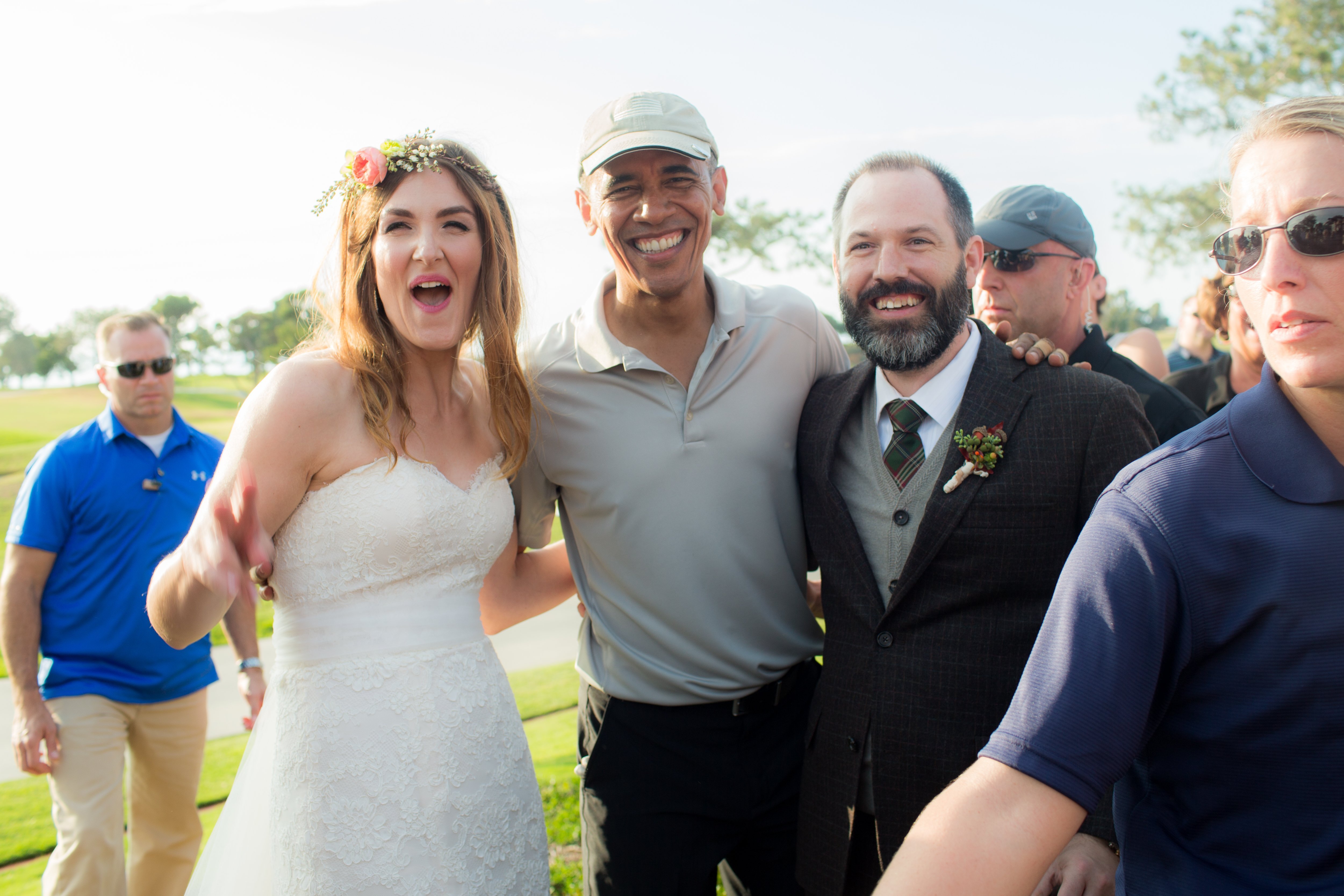 President Obama "crashed" a California wedding on Sunday, surprising the bride and groom with an appearance in their wedding photos.