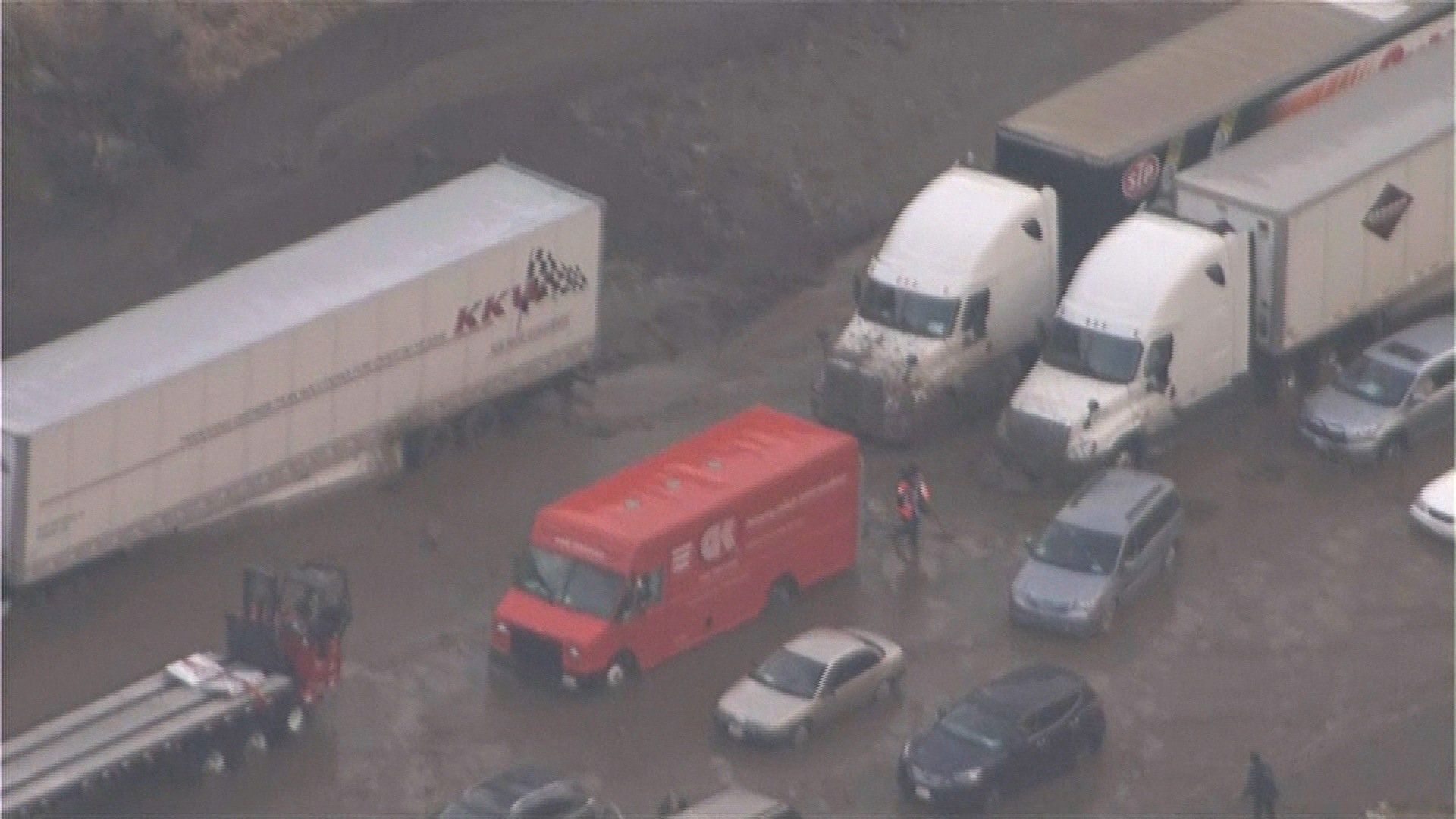 Southern California authorities scrambled to rescue motorists stranded on roadways as flash floods and large hail pounded areas north of Los Angeles. Flash floods sent water flowing into roads Thursday, triggering mudslides that forced the closure of a portion of Interstate 5. Some motorists fled, while others sat trapped in cars and called 911 for help, according to Lisa Williams of the Los Angeles County Emergency Management.