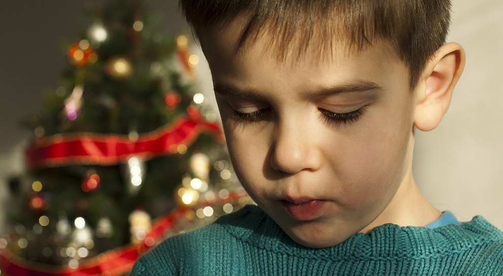 Unhappy child on Christmas