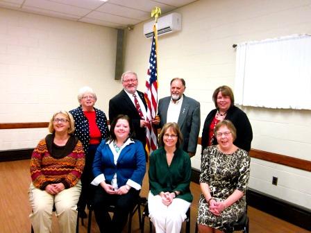 Pictured in the front, from left, are Susan Pyke, incoming vice president and Lions Club president; Holly Komonczi, VCC; Kathy Gillespie, Rotary Club president; and Susan Wingard, incoming secretary and GFWC president.  In the back row are Janice Elensky, incoming treasurer; Bill Williams, incoming president; Duane Test, outgoing president; and Sheila Williams, BPW president. (Photo by Wendy Brion)