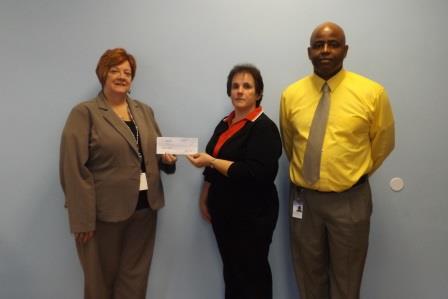 Shown, from left to right, is Cen-Clear’s Chief Executive Officer, Pauline Raab accepting the check from Rosemary Broome representing RMHC and Sean Rockmore, Cen-Clear family community partnership coordinator. (Provided photo)