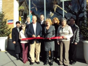 Pictured in the first row, from left, are Donna Veihdeffer; Owners Robert Moore and Dana Wilson; and CRC Main Street Manager, Loretta Wagner. In the second row are Commissioners Tony Scotto and John A. Sobel, State Rep. Matt Gabler, State Sen. John Wozniak Rep. Jackie Kendrick and Commissioner Mark B. McCracken. (Provided photo)