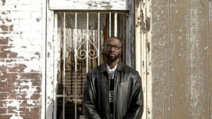 Melvin White walks down an empty Dr. Martin Luther King Drive in St. Louis, Missouri, recounting what once was a business or a home, but is now a rundown shell. n 2004, White began to notice the stark contrast between the poor conditions on Dr. Martin Luther King Drive and a parallel street, which was once impoverished but has since experienced development and is now full of bustling businesses.