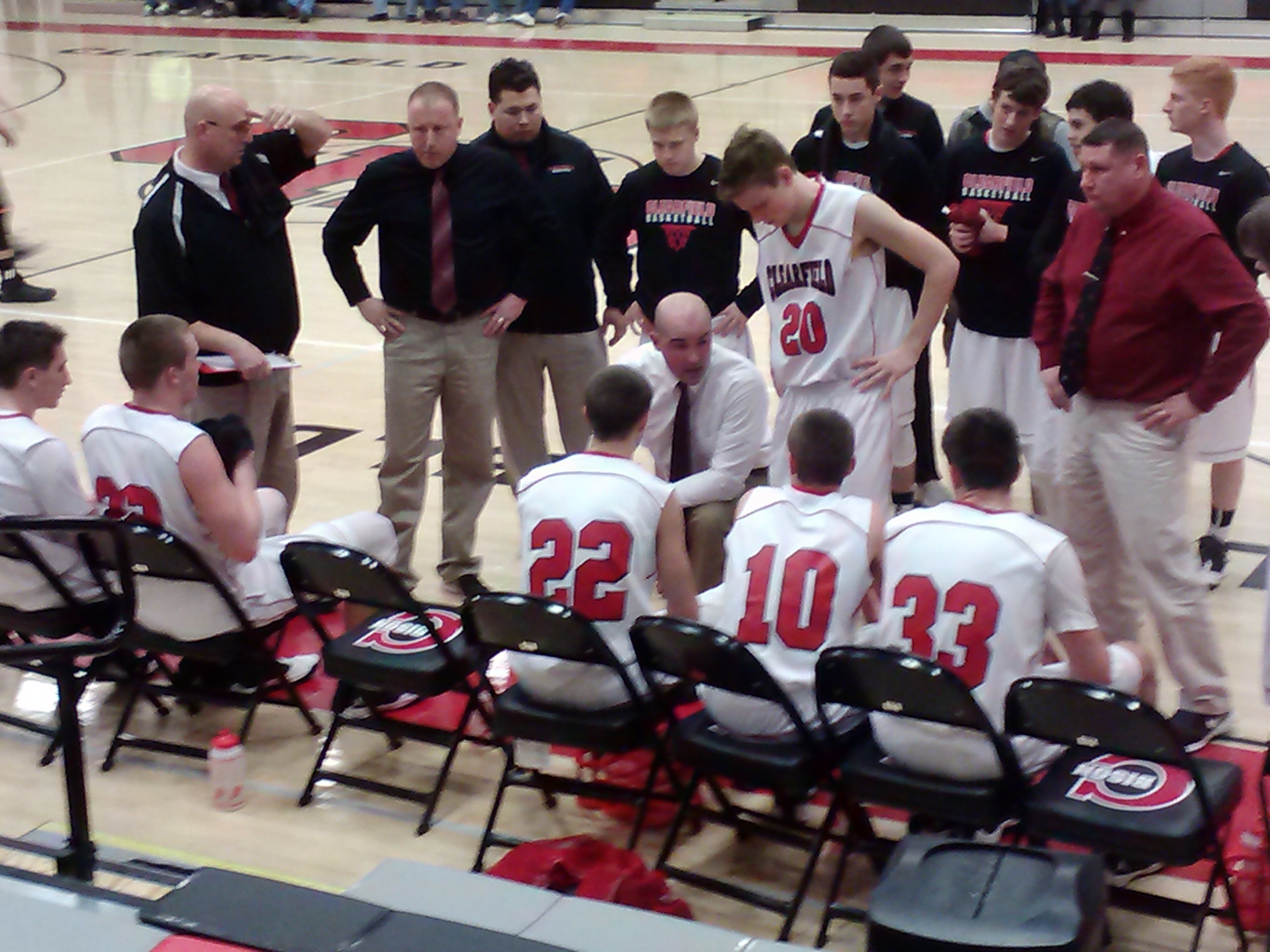 Head Coach Nate Glunt rallying the troops late in the 4th Quarter (photo by Jay Siegel)