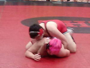 Bison Travis Ogden controls the action before pinning 