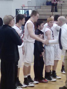 Coach Glunt handing out the gold medals to Cody Spaid, with Wil Myers next in line (Photo by Jay Siegel)