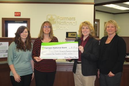 From left to right Dustie Dahl and Diane Bradford of Farmers National Bank, present a $3,500 check to Penn State DuBois Chancellor Melanie Hatch and Director of Development Jean Wolf.  (Provided photo)