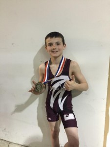 Brady Collins with his PJW State Championship silver medal (Photo by Tiffany Nichols)