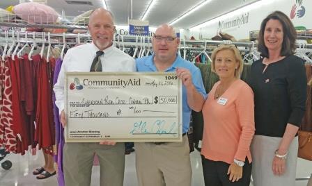 CommunityAid Executive Director Glenn Chandler (second from left) is shown with Red Cross staff members Tom Szulanczyk (North Central Pennsylvania Chapter executive director), Jenn Wiggin (major gift officer) and Sims. (Provided photo)