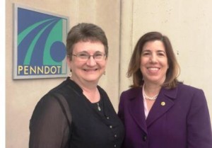 Karen Michael (left) newly-named District Executive for PennDOT District 2 is congratulated by PennDOT Secretary Leslie S. Richards. (Provided photo)