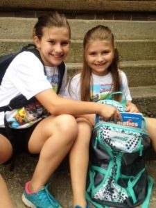 Lauren and Lily Davidson of Clearfield learn to “loosen the load” when it comes to backpacks and other heavy lifting. (Provided photo)