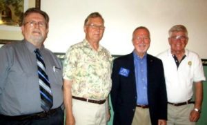 Shown are Assistant District Governor Calvin Thomas, Ron Strattan, Bennett and Club President Joe White. (Provided photo)