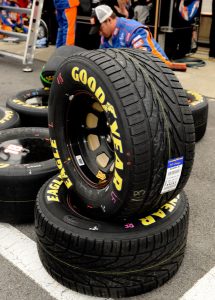 WATKINS GLEN, NY - AUGUST 08: A crew member of the #18 NOS Toyota, prepares rain tires in the pit box during the NASCAR Nationwide Series Zippo 200 at Watkins Glen International on August 8, 2009 in Watkins Glen, New York. (Photo by Rusty Jarrett/Getty Images for NASCAR)