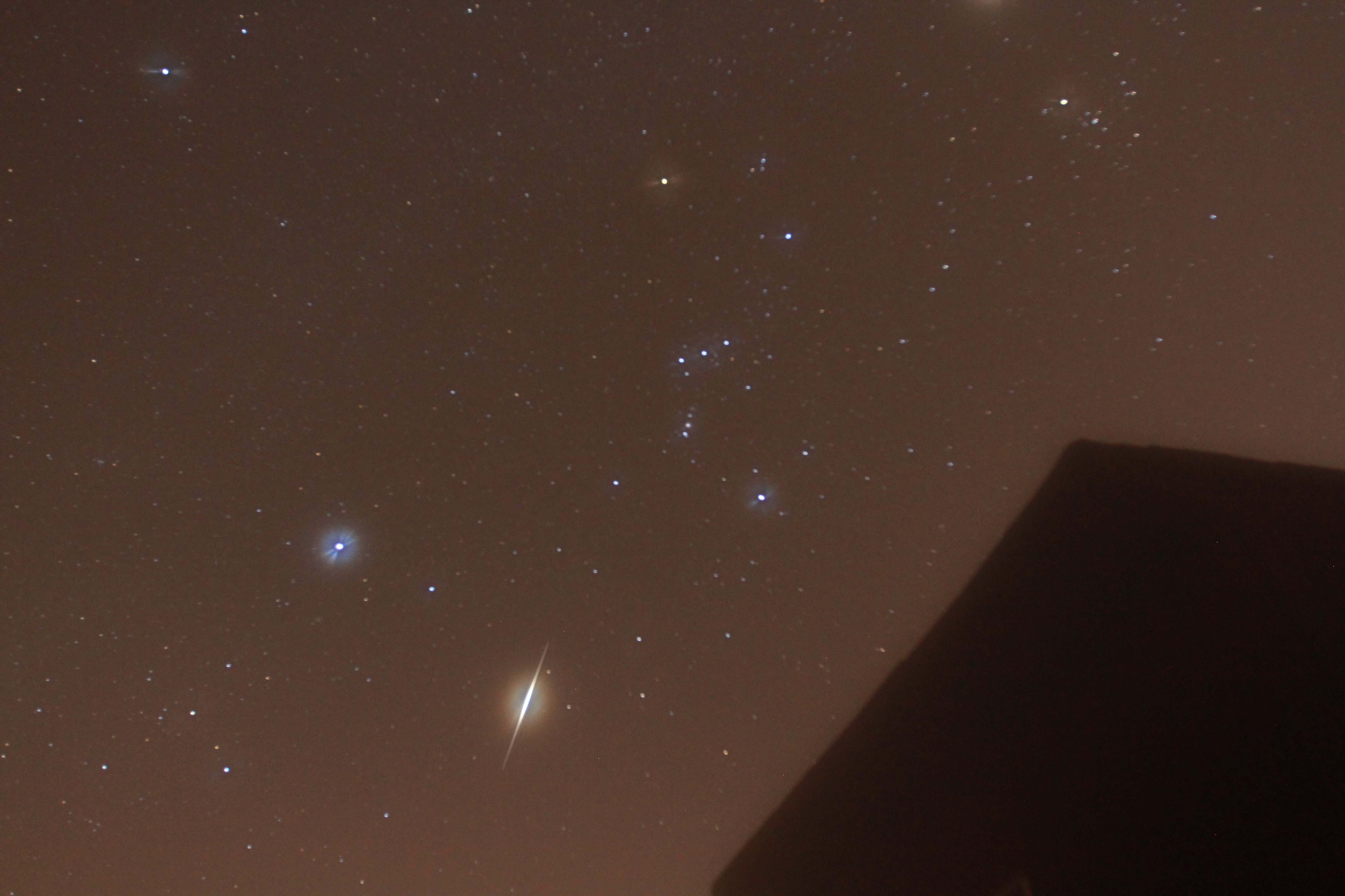 File-Possible meteors streak the night sky above LaGrange, Georgia at the peak of the Orionid Meteor Shower on Sunday, October 21, 2012.