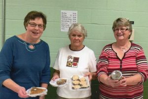 Susan Wingard, president, Sharon Eisenhower, treasurer and Jackie Trifelli, craft chairman, show off some of the baked goods that will be available at the craft show sponsored by GFWC Curwensville. (Provided photo)