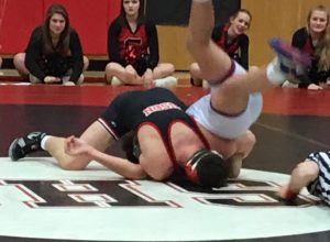Down 5-2 early, Luke McGonigal came back for a pin and his 21st win on the year (photo by Jay Siegel)