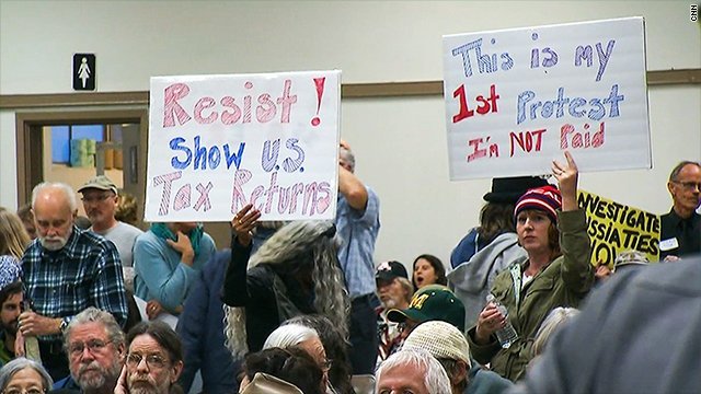 Constituents push for the release of President Trump's tax returns at town halls across the country.