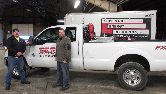 Eric Lundberg, left, poses with Superior Energy Resources LLC Safety/Compliance Director Korey Brownlee. The company achieved a safety milestone of having no recordable incidents related to safety for three consecutive years. (Provided photo)