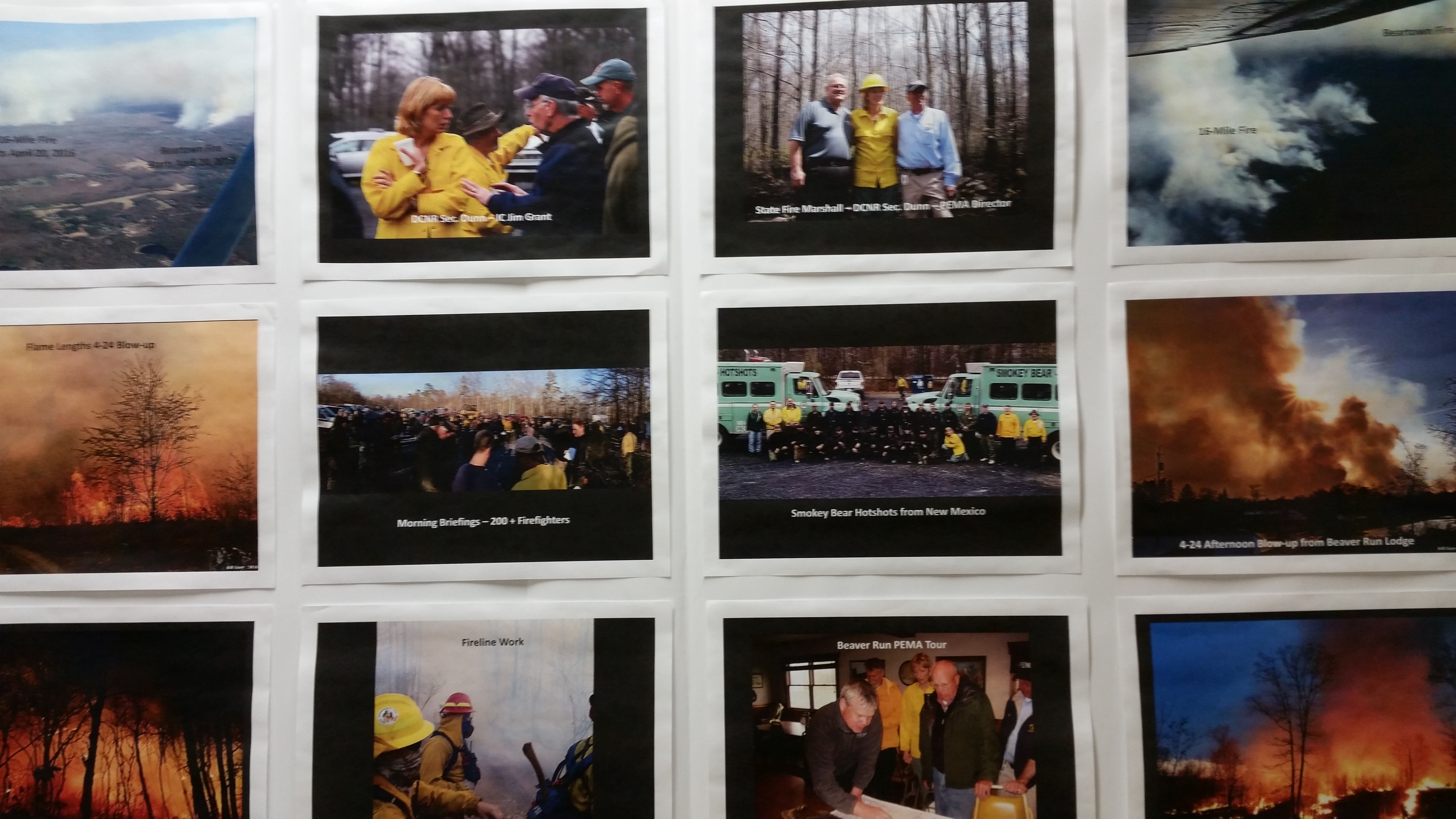 A photo-board displays scenes from the 16 Mile Fire which burned in Barrett Township, Pennsylvania April 20-25. The incident was one of the worst fires the state has experienced in 25 years. Local Forest Fire Wardens heard a presentation on the fire at the Forest Fire Wardens Training Banquet Tuesday. The event was held to honor the work of the fire wardens and to prepare for the upcoming 2017 wildfire season (Photo by Kimberly Finnigan)