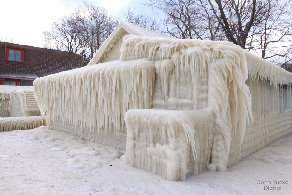 A home on Lake Ontario in Webster, New York, was covered in ice after several days of freezing temperatures combined with winds and moisture from the lake.