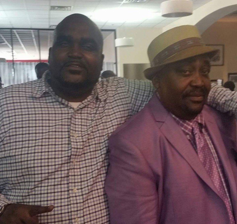 FILE PHOTO: Terence Crutcher, left, with a relative.