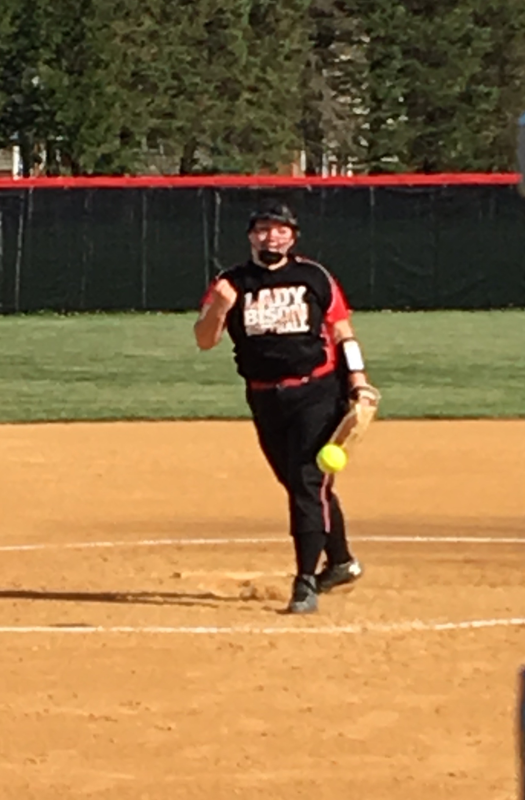 Abby Fedder dealas apitch during the loss to the Mounties (Photo by Jay Siegel)