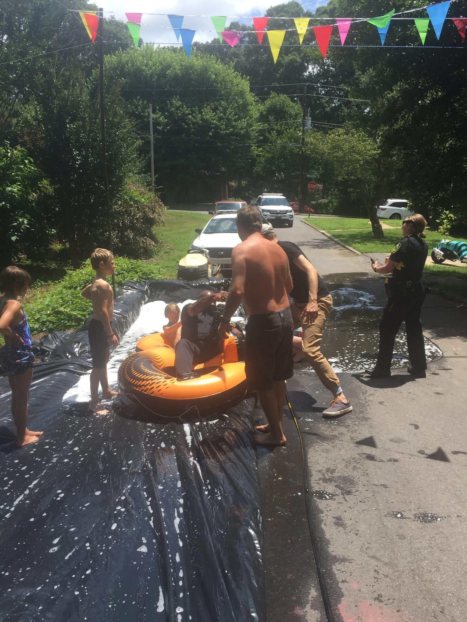 Officer Carrie Lee and Officer Joe Jones joined a party for a moment instead of breaking it up.