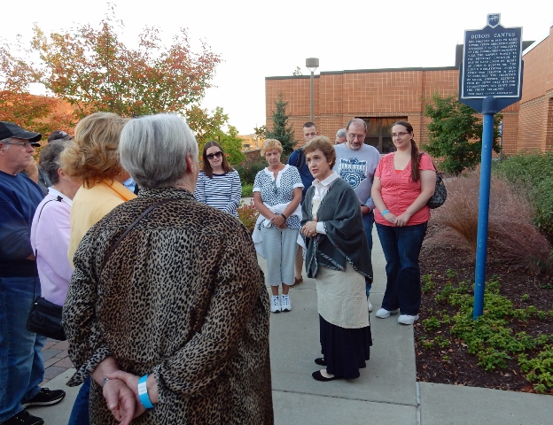 Carolyn Rhoades as cook Annie Maloney talks to one of the tours. (Provided photo)
