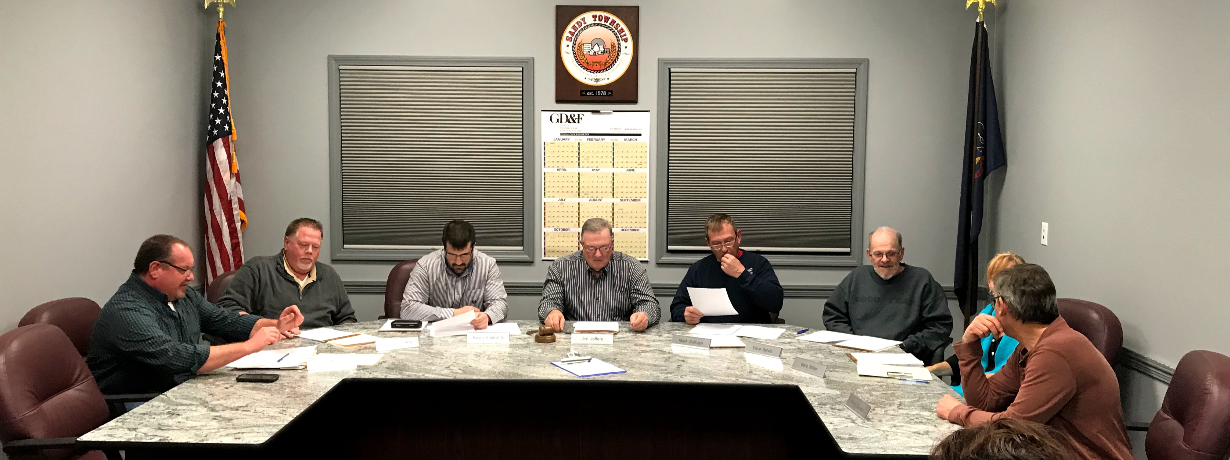 The Sandy Township Supervisors read through the letters of interest.
  (Photo by Steven McDole)