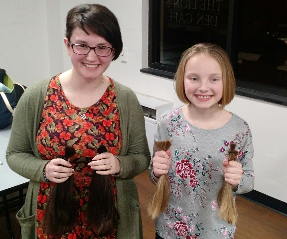 THON Dancer Julie Test, left, and nine-year-old Kendall Lashinsky both committed to donating the hair they had cut at the THON Hair Auction to organizations that make real-hair wigs for those dealing with illness related hair loss. (Provided photo)