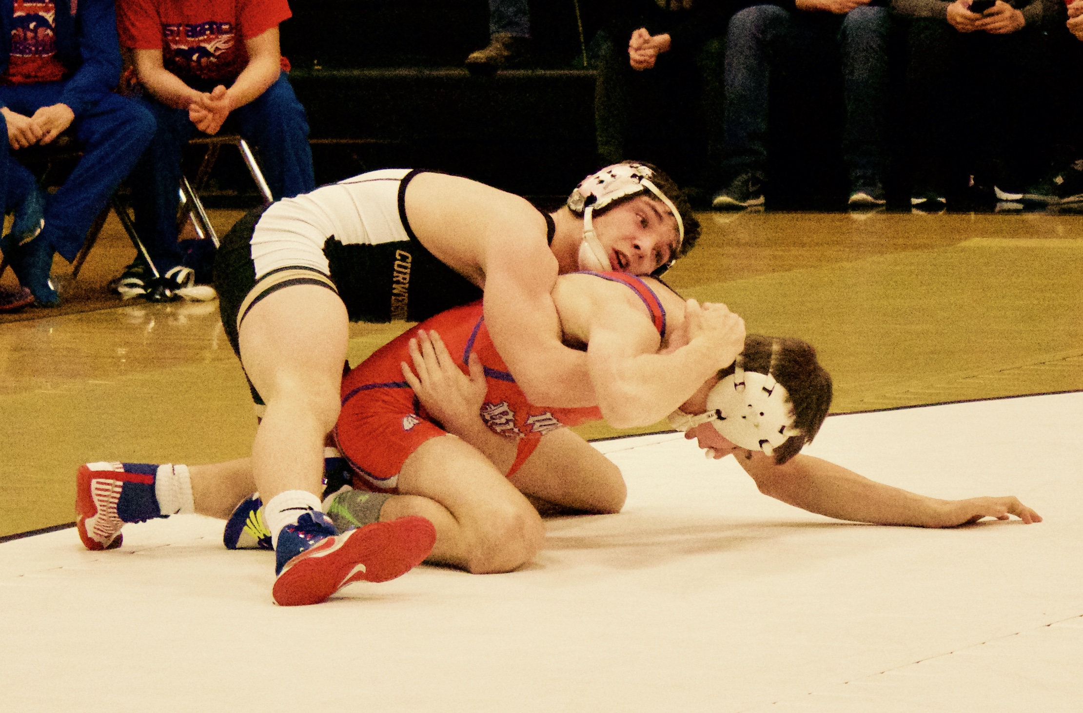 Blake Passarelli works a gut wrenching tight waist and half nelson. He won his match 3-2 (Photo by HL)