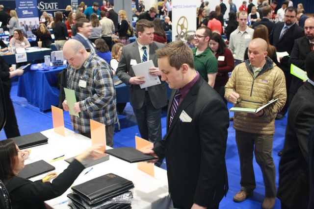 Student Dan Hinton, in front, prepares to meet with potential employers as he registers for the Penn State DuBois Career Fair. (Provided photo)