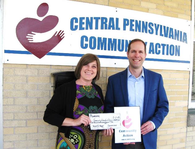 Shown are Deanna Graham, CPCA family services manager, and Brian Paganie, FirstEnergy, manager external affairs. (Provided photo)