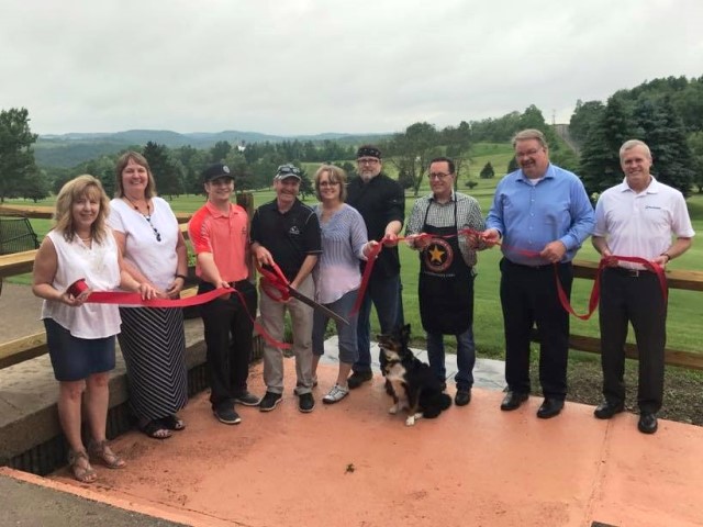 Shown, from left, are:  Kim McCullough, Chamber director; Dawn Shaw, Helmbold & Stewart; Dayton, Teresa and James Skinner;  Rick Wean, Eagles Ridge chef; Kenn Starr, Starr Hill Vineyard & Winery; Kevin Wain, chair, CNB; and Mike Ryan, Northwest Bank. (Provided photo)