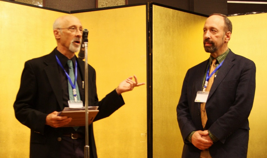 Paul Lewis, professor of English at Boston College, left, presented Distinguished Professor of English Emeritus Richard Kopley with the Lifetime Achievement and Service Award from the Poe Studies Association (PSA) at the 2018 International Poe and Hawthorne Conference in Kyoto, Japan. (Provided photo)