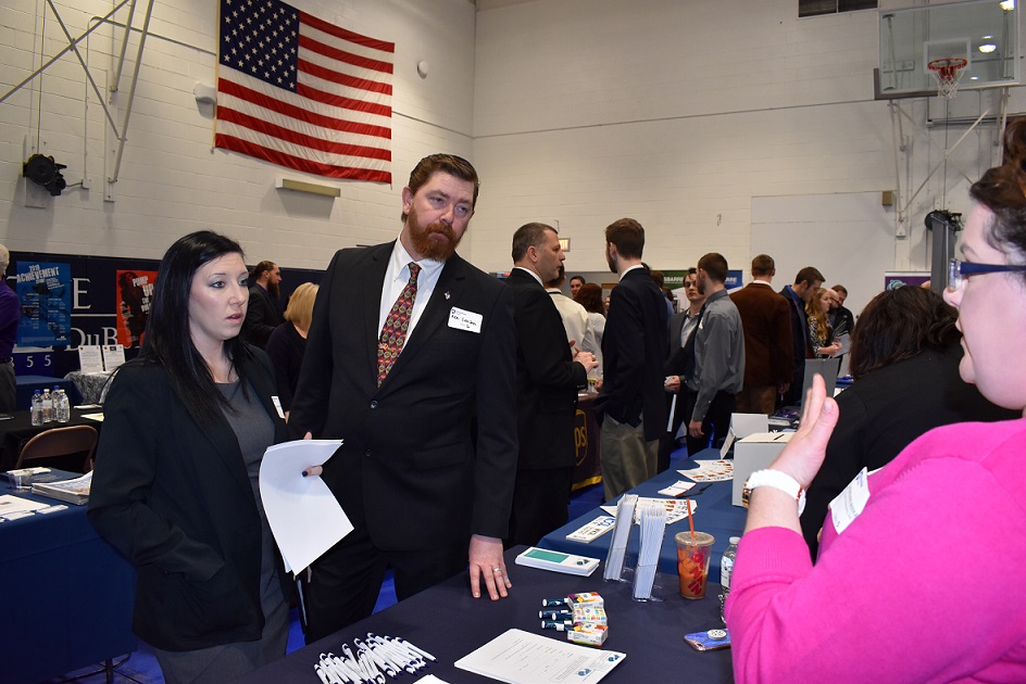 Students Laura Ruane and Ken Larsen, at left, learn about career opportunities in the mental health field by speaking to Stephani Seidle, a representative from Roads to Recovery of Clearfield and Clarion. (Provided photo)
