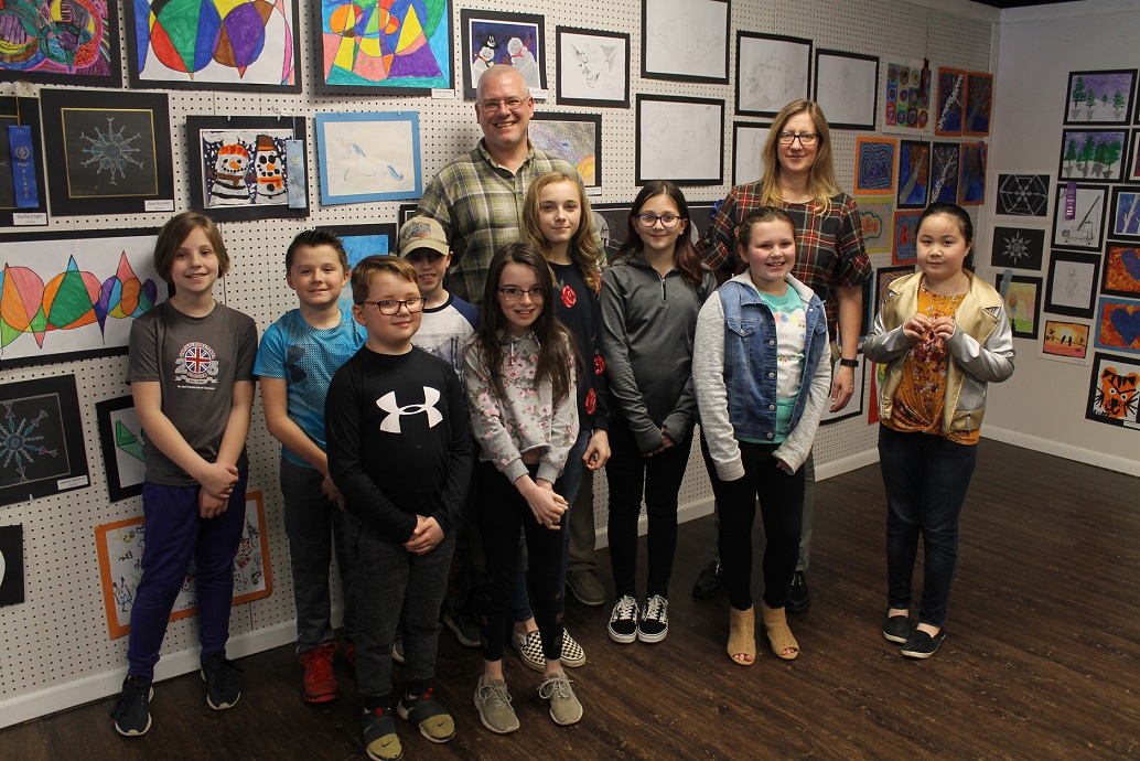 Students and teachers from the Clearfield Elementary School attended the art show at the Susquehanna River Arts Center of Clearfield.  From left are: Abrielle Hodanish, Brett Fletcher, Kaleb Samsel, Tucker Scott, Megan Shobert, Katie Peacock, Caitlyn Albertson, Ava Hoover and Ellie Weible and Mr. Sam Richards and Mrs. Renee Shaw, Clearfield Elementary School art teachers. (Provided photo)