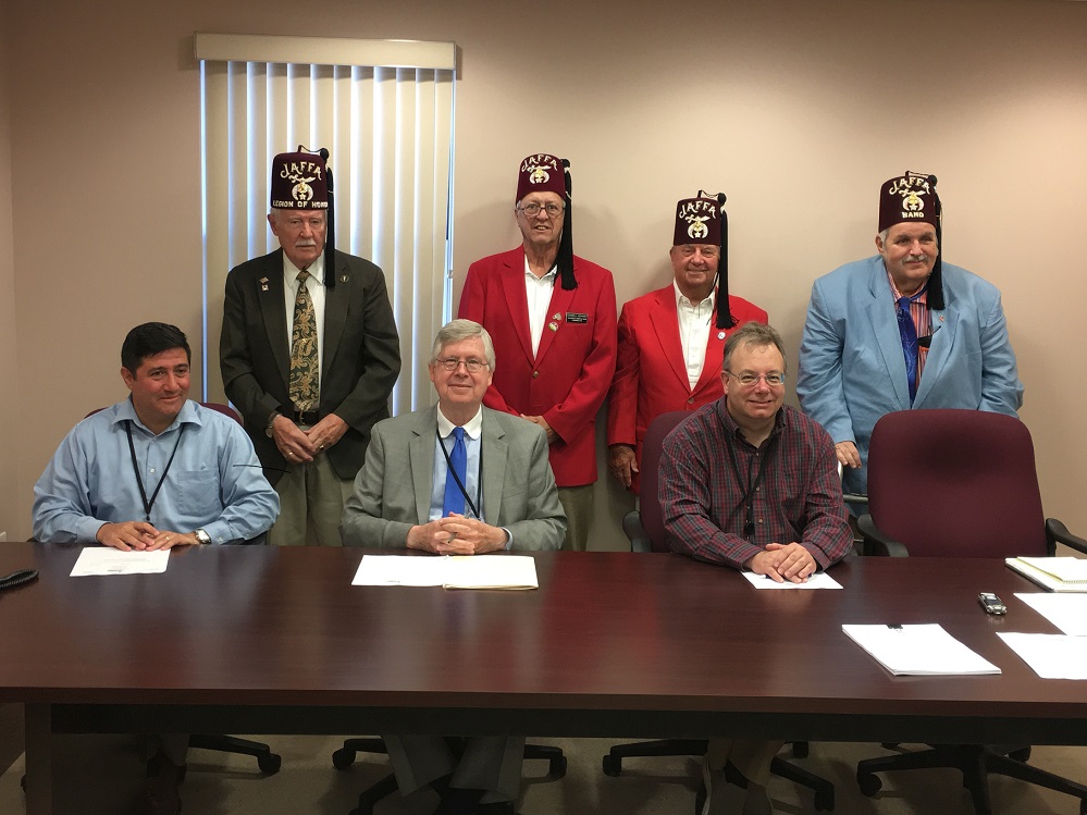 Pictured, in front, are Commissioners Tony Scotto, John A. Sobel and Mark B. McCracken. In back are: Ed Blakely, president; Darrell Kephart, Oriental Band; Roul Jacobson, Oriental Band; and the Rev. Dr. Robert Ludrowsky, secretary/treasurer. (Photo by GANT News Editor Jessica Shirey)