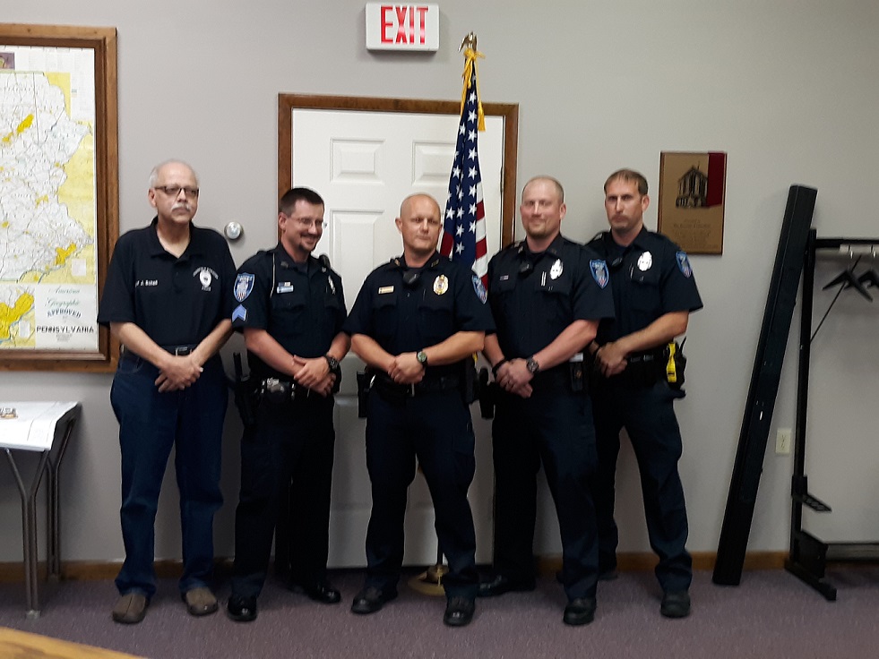 Pictured, from left to right, are: Mayor James Schell, Assistant Chief Nathan Curry, Chief Vincent McGinnis, Sgt. Daniel Podliski and Cpl. Shawn Fye. (Provided photo)