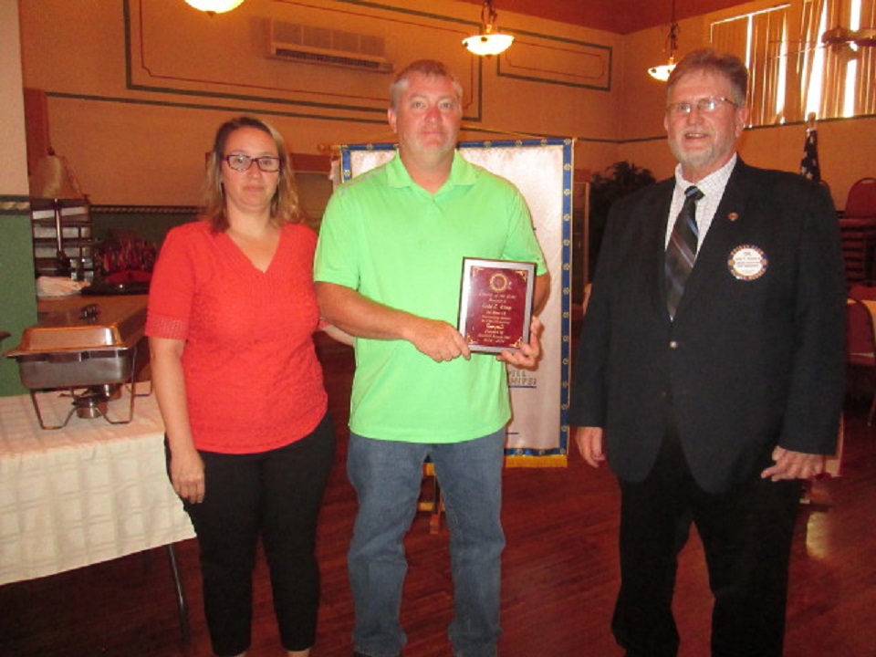 Pictured are Jessica and Todd Kling with Cal Thomas, Rotary assistant district governor, who presented the Citizen of the Year plaque. (Provided photo)