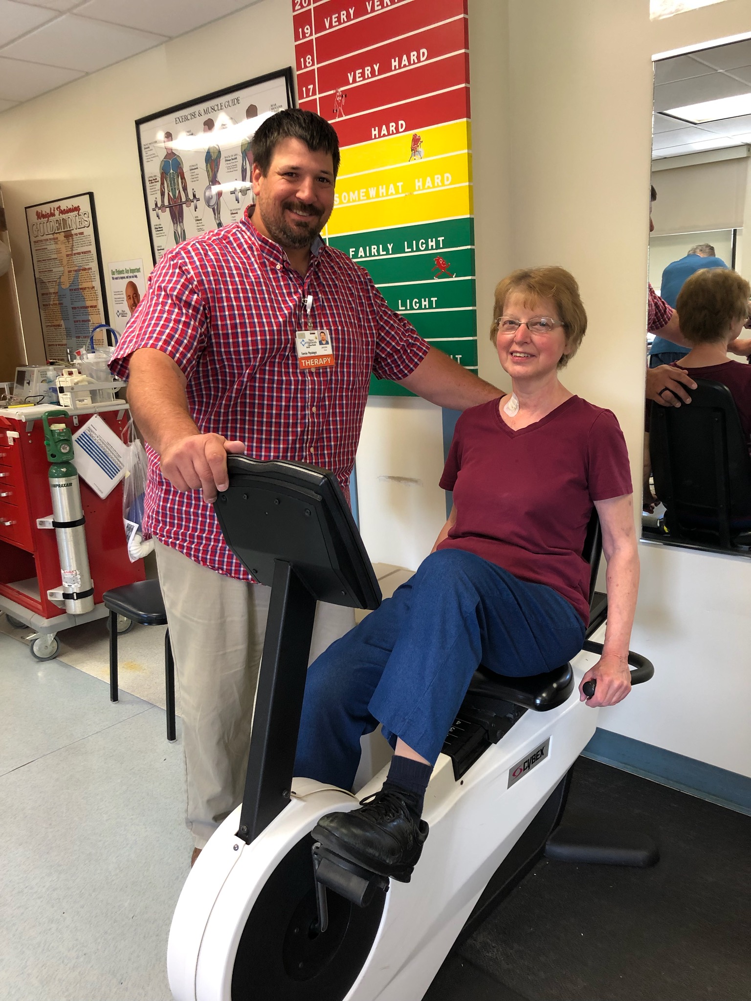 Viki Bell of Clearfield is shown exercising during a session of Cardiac Rehab at Penn Highlands Clearfield under the guidance of Jason Yale, Exercise Physiologist at PH Clearfield. (Photo submitted)
