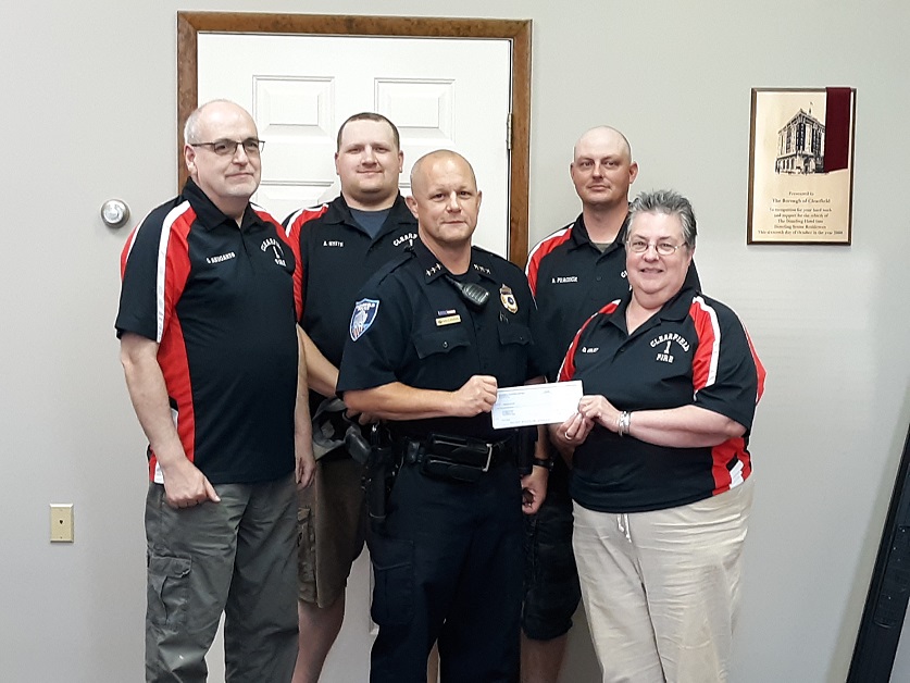 Pictured, in the front, are Police Chief Vincent McGinnis and Clearfield Fire Department President Deb Gray. In the back are Treasurer Gary Shugarts, Assistant Fire Chief Andrew Smith, and Member Randy Peacock. (Photo by Wendy Brion)