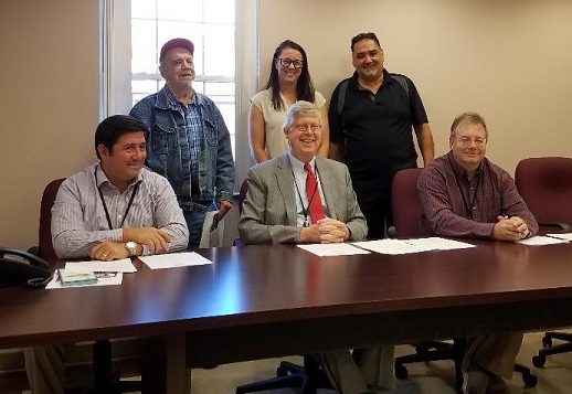 Clearfield County Commissioners Tony Scotto, John Sobel and Mark McCracken (L-R seated) and Bilger's Rocks Association Members Terry O'Conner, Leslie Buffone, and Dennis Biancuzzo (L-R standing) pose for a photo after the commissioners signed a proclamation declaring September as "National Recovery Month" (Photo by Kimberly Finnigan)