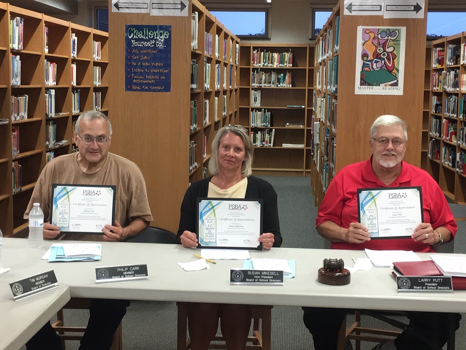 During Monday night’s meeting, three school board members were recognized by Erin Eckerd, a representative of the Pennsylvania School Board Association.
Board President Larry Putt (right) was recognized for 16 years of service while board members Phil Carr (left) and Susan Mikesell (center) were recognized for having 12 years of service.
(Photo by GANT News Editor Jessica Shirey)
