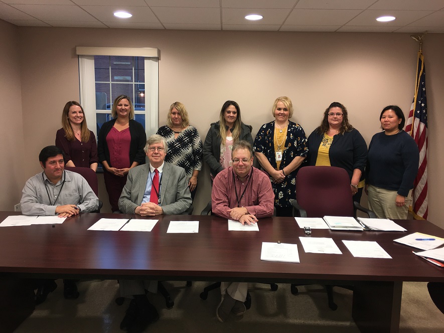 On Tuesday the Clearfield County Commissioners proclaimed November as National Adoption Month. Pictured, from left, are Shannon Kelly, Amanda Clark, Jennifer Teats, Charity Selvage, Lori Baronak, Melissa Sloppy and Kate Wood, all from the Children’s Aid Society. (Photo by GANT News Editor Jessica Shirey)