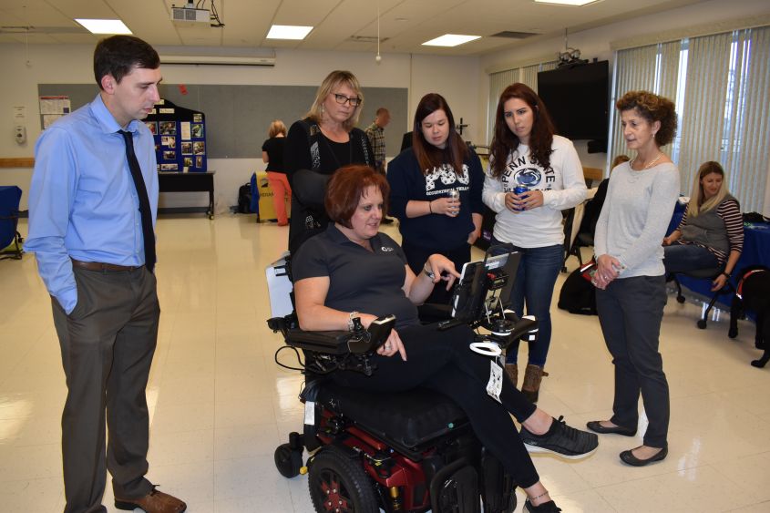 Melissa Davis from Laurel Medical Solutions demonstrates the use of a wheelchair equipped with Eye Gaze technology at the Penn State DuBois Assistive Technology Fair. The system allows the user to control movement of the wheelchair using only their eyes. (Provided photo)