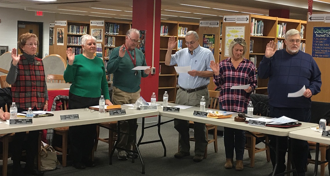 Re-elected Clearfield school board members took their oath of office Wednesday night. Pictured, from left, are Gail Ralston, Mary Anne Jackson, Tim Morgan, Phil Carr, Susan Mikesell and Larry Putt. (Photo by GANT News Editor Jessica Shirey)