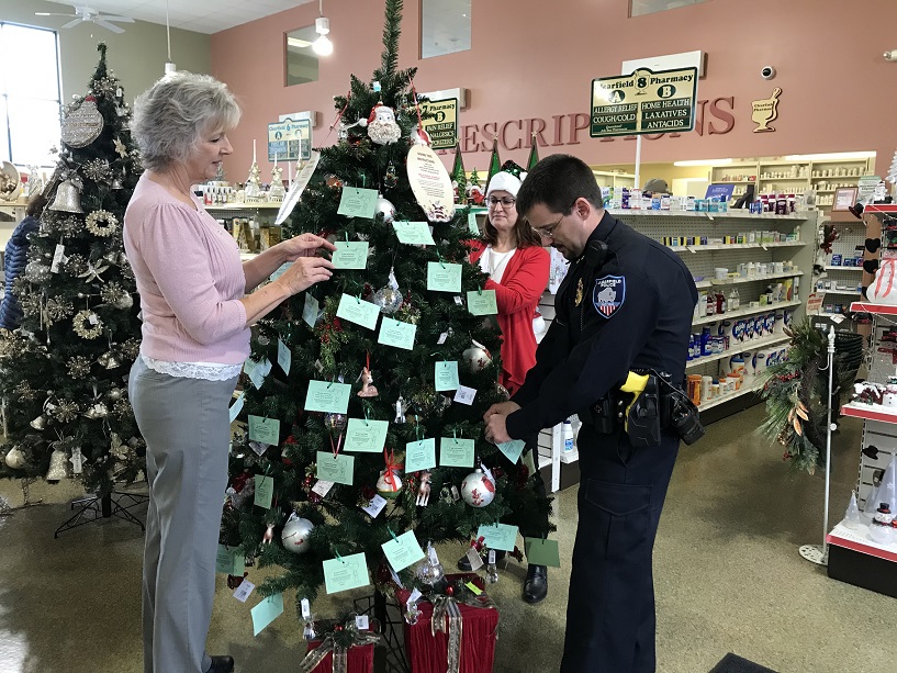 Pictured, from left, are: Darla Smay of Clearfield Pharmacy & Gift Shoppe, Ronda Vaughn, fundraising & events specialist for the CCAAA and Clearfield Borough Assistant Chief of Police Nathan Curry. (Provided photo)