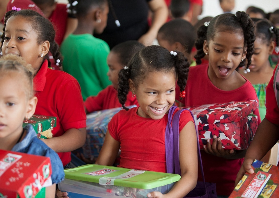 Children received gifts during a shoebox delivery in the Dominican Republic. Photo credit: Samaritan’s Purse.